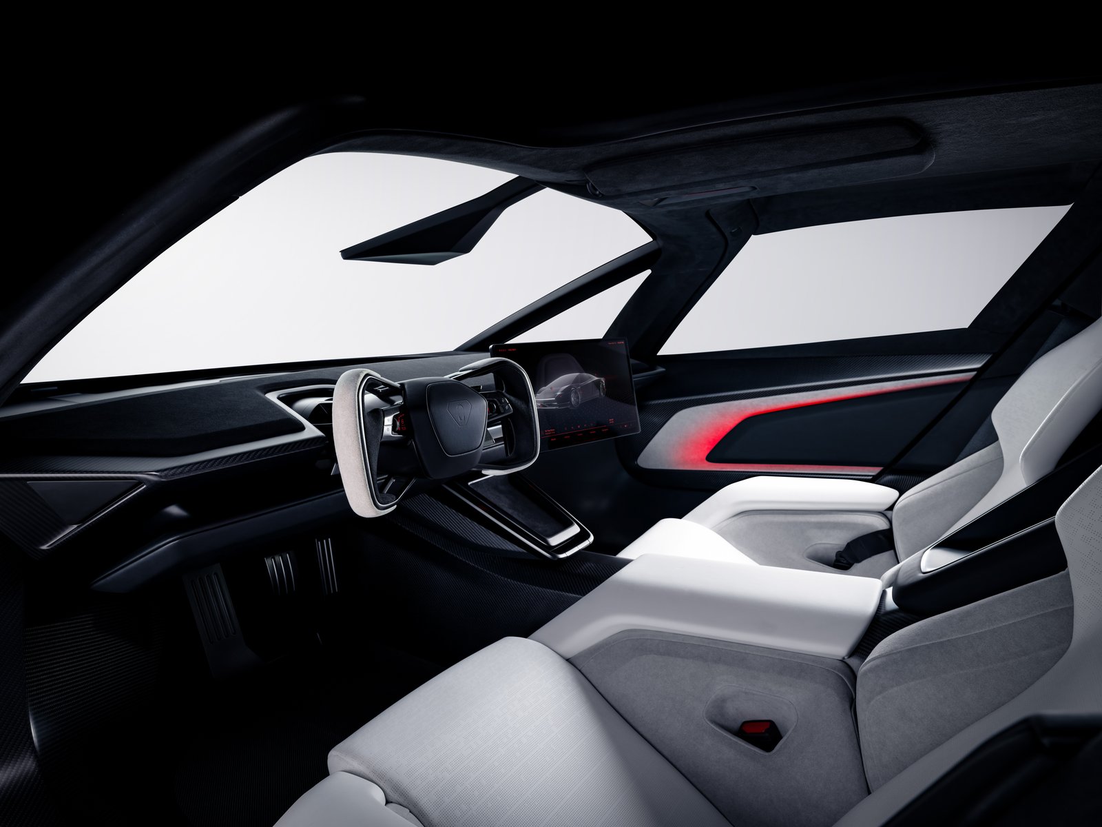 The Tesla Roadster's two-seat cabin seen from behind the seats: a yoke, a center touchscreen, white seats with gray microsuede, and red accent lighting in the doors
